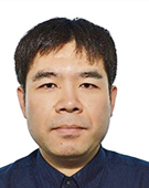 スーツの男性廣田氏