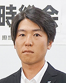スーツの男性柳田氏