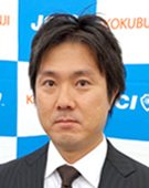 スーツの男性小坂氏